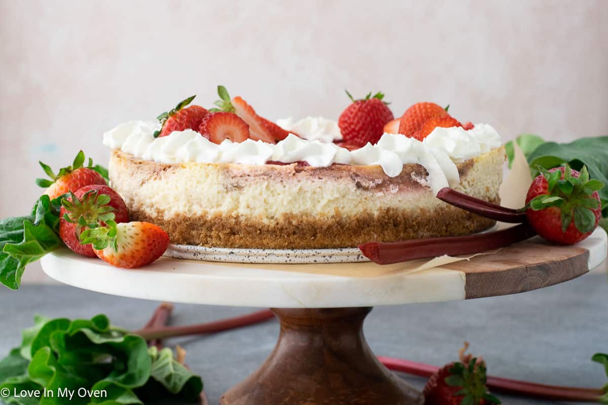 https://loveinmyoven.com/wp-content/uploads/2023/07/strawberry-rhubarb-cheesecake.jpg